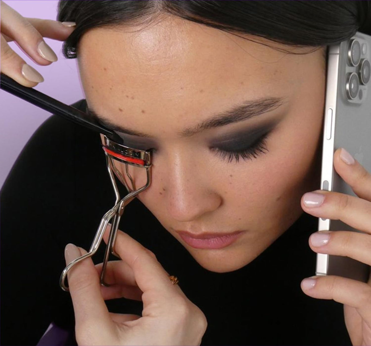 The Eyelash Curler: Easy use. Long-lasting curl of lashes effect. Wide opening. Stainless steel with two red lash