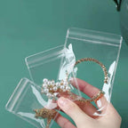 Small Plastic Bags, 100 Pcs Mini Baggies, Clear Plastic Jewelry Thick Self Sealing PVC Bags, Resealable Poly Baggies