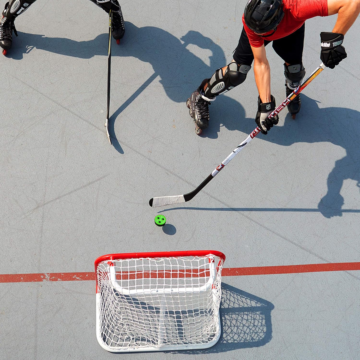Franklin Sports NHL Street Hockey Puck - X3 Roll-a-Puck Outdoor Roller Hockey Puck - Official Size Street Hockey Puck